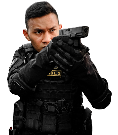 A participant in firearms competency training, learning how to safely handle and operate firearms, in compliance with South African regulations.